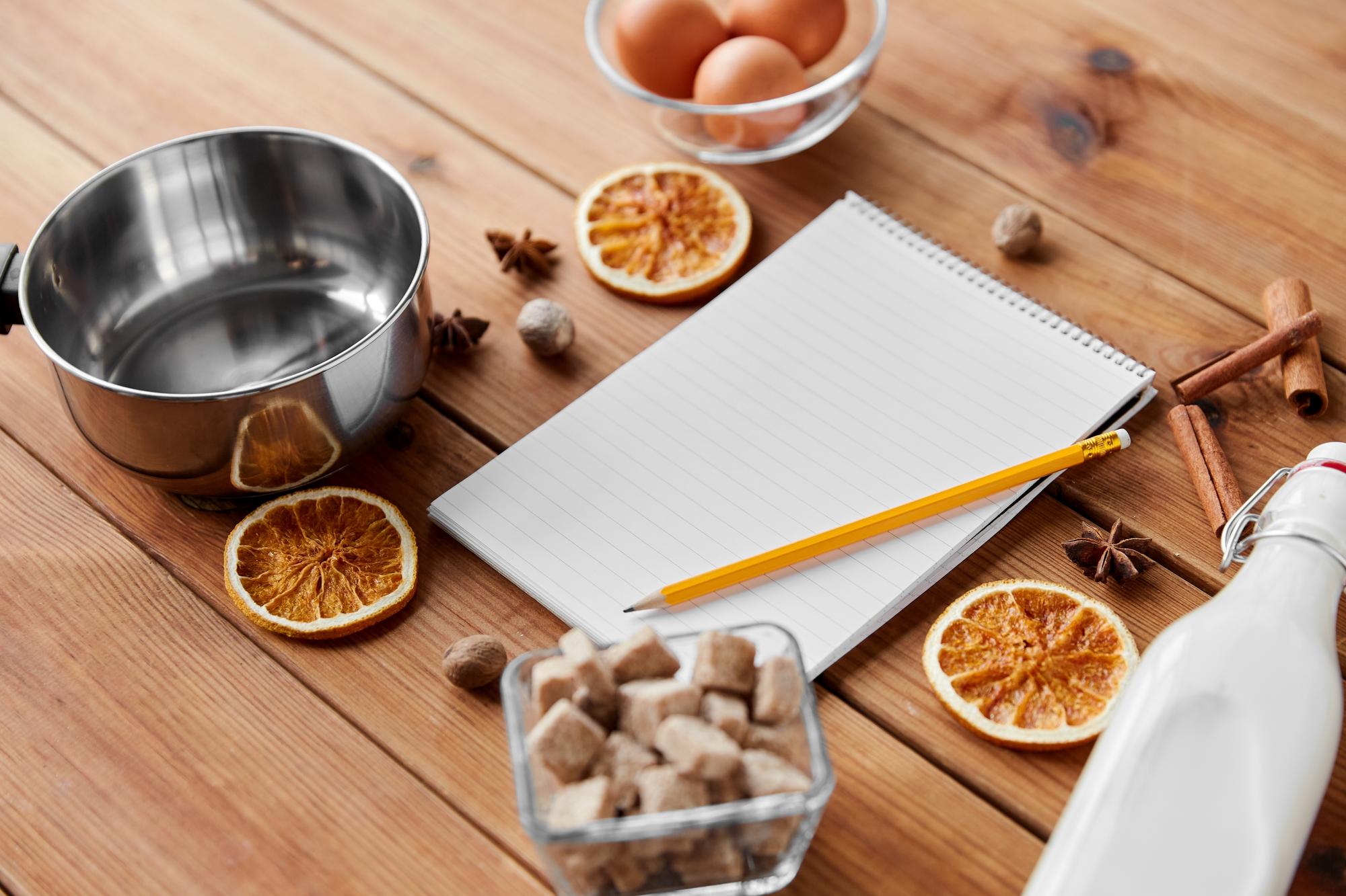 workshop station with ingredients and notebooks
